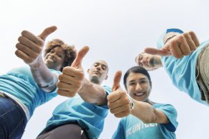 People showing thumbs up.