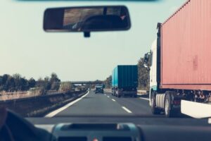 A view at the highway from the moving truck