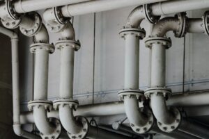 An image of white metal pipes