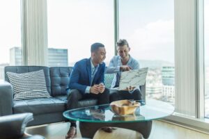 Two men discuss a homebuyers guide to Cleveland