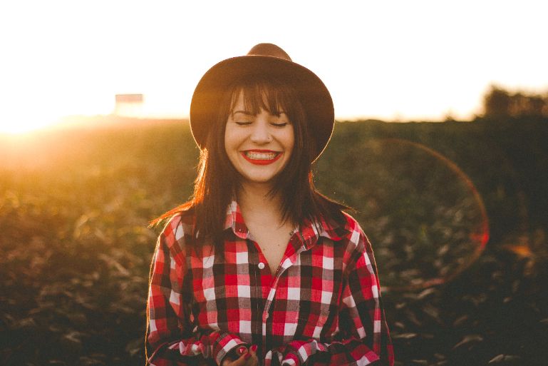 A young woman smiling